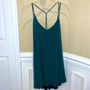 Green mini dress with open back